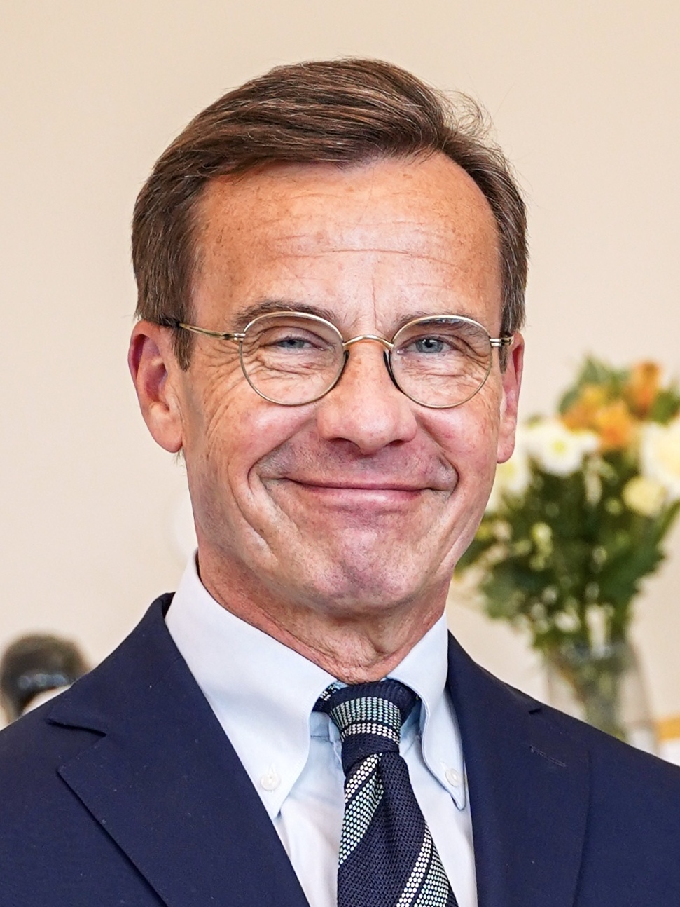 Ulf Kristersson na akci v červnu 2025